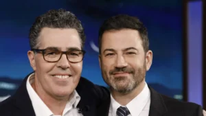 Adam Carolla Defends Jimmy Kimmel Amid Melania Trump “Expectant Widow” Backlash: “Pretty Typical Roast Joke”